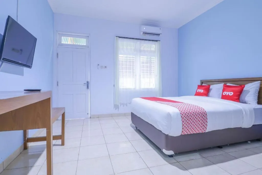 Bed in OYO 1755 De'balcon Accomodation Near Ngurah Rai Airport