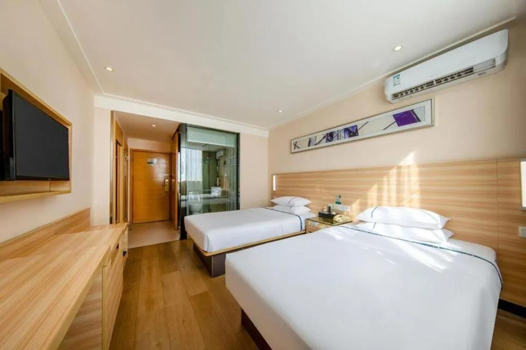 Bed in City Comfort Inn Zhanjiang Shimao Building Chikan Old Street