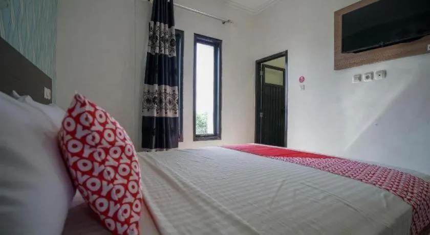 Bed in Hotel O Green Palm Kostel Syariah