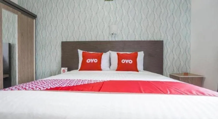 Bed in Hotel O Green Palm Kostel Syariah