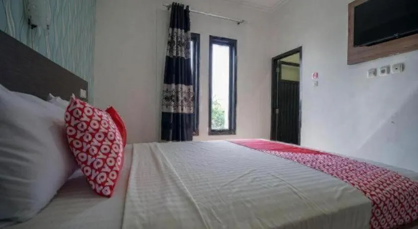 Bed in Hotel O Green Palm Kostel Syariah