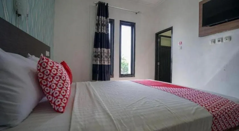 Bed in Hotel O Green Palm Kostel Syariah