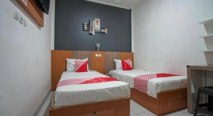 Bed in Hotel O Green Palm Kostel Syariah