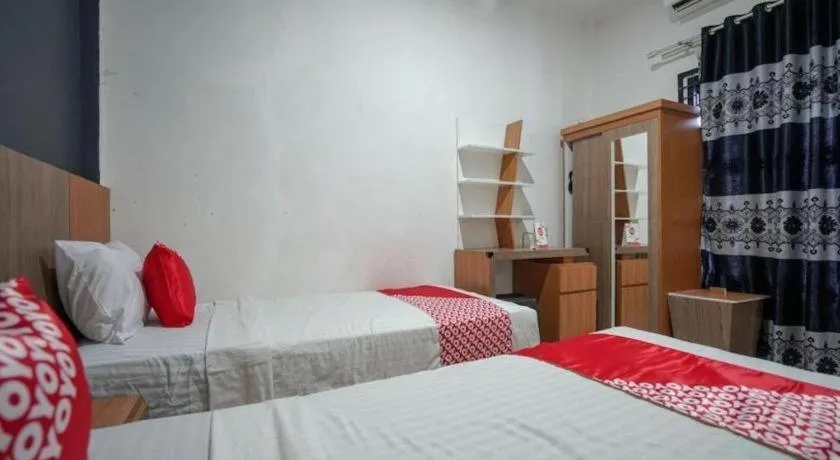 Bed in Hotel O Green Palm Kostel Syariah