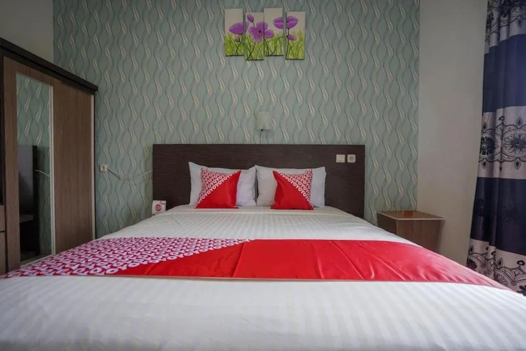 Bed in Hotel O Green Palm Kostel Syariah