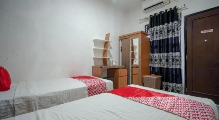 Bed in Hotel O Green Palm Kostel Syariah