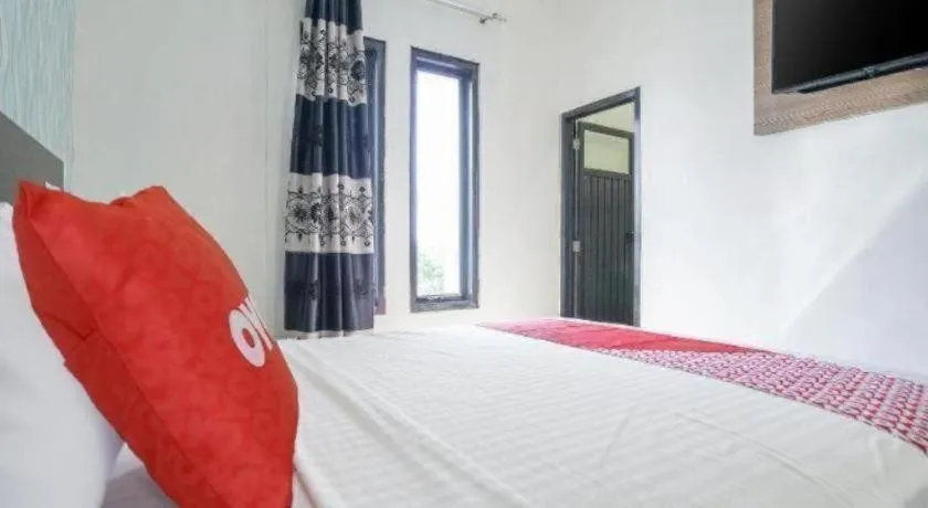 Bed in Hotel O Green Palm Kostel Syariah