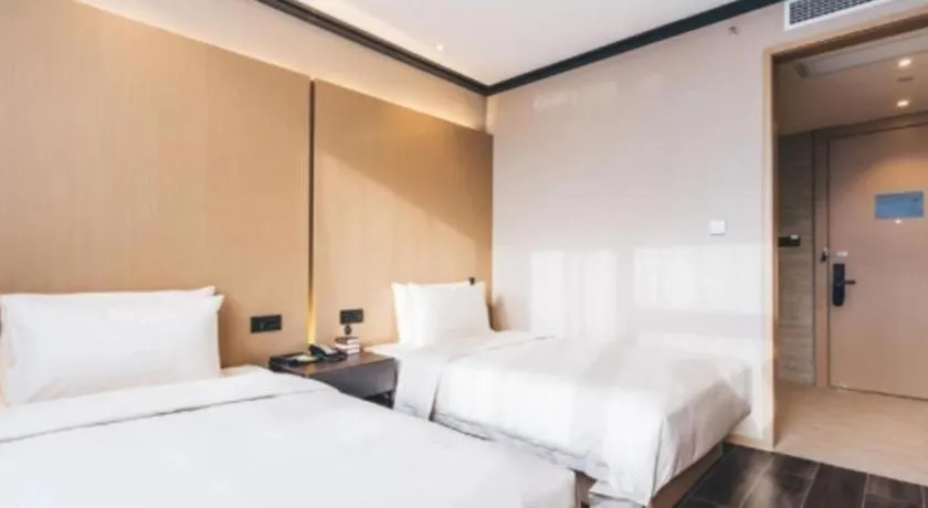 Bed in Atour Light Hotel Hangzhou Future Sci-Tech City