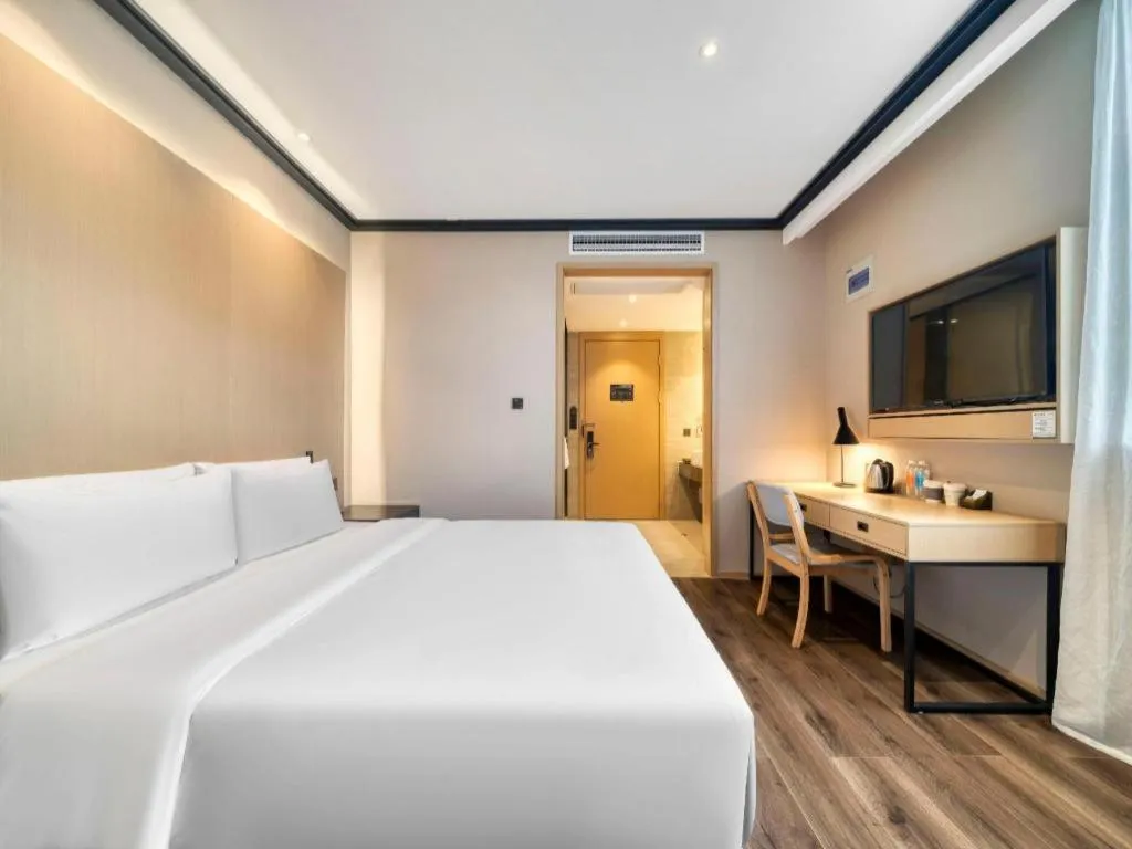 Bed in Atour Light Hotel Hangzhou Future Sci-Tech City