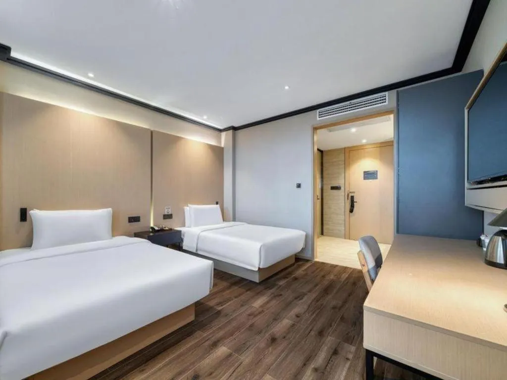 Bed in Atour Light Hotel Hangzhou Future Sci-Tech City