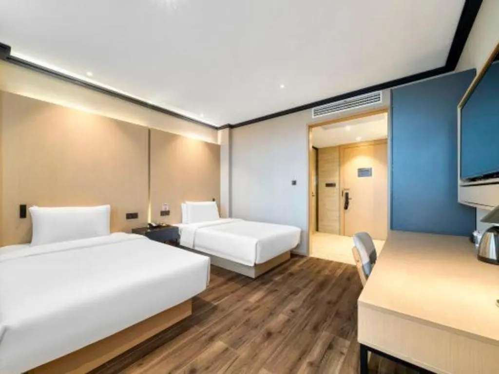 Bed in Atour Light Hotel Hangzhou Future Sci-Tech City