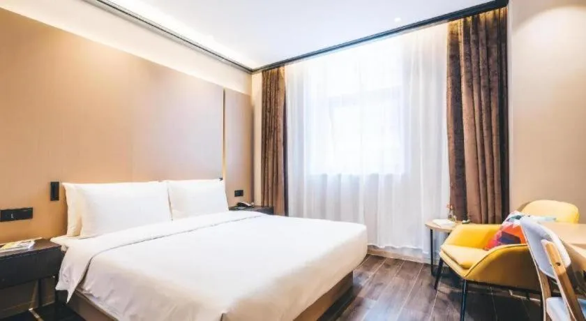 Bed in Atour Light Hotel Hangzhou Future Sci-Tech City