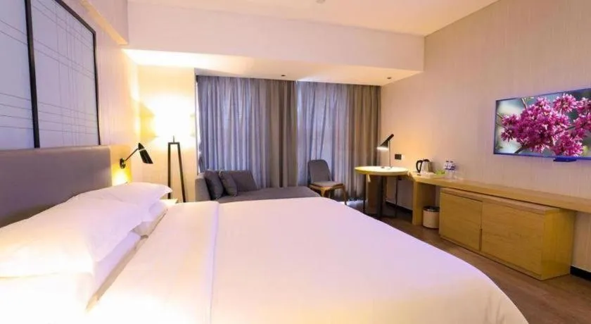 Bed in GreenTree Eastern Hotel Hunan Changsha Xinsha Luositang Metro Station