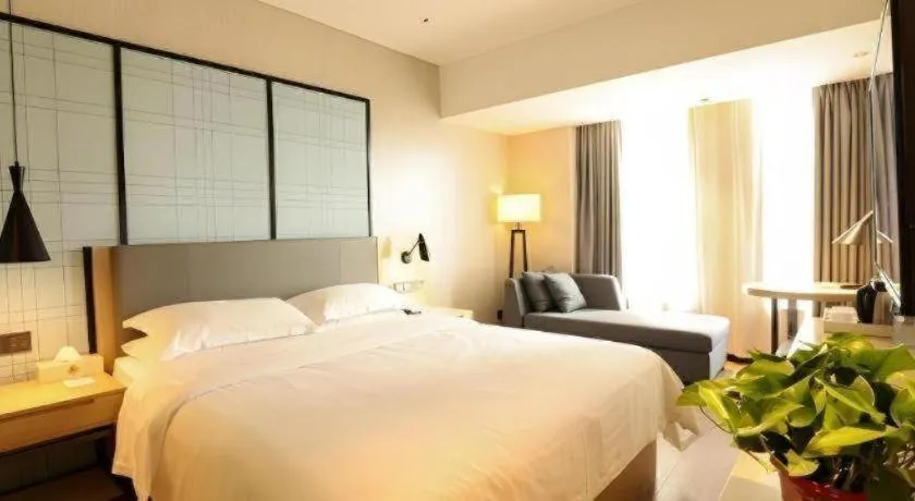Bed in GreenTree Eastern Hotel Hunan Changsha Xinsha Luositang Metro Station