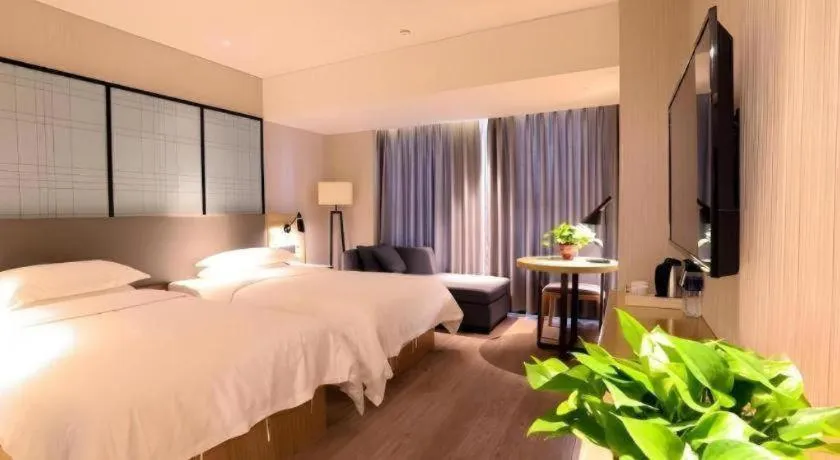 Bed in GreenTree Eastern Hotel Hunan Changsha Xinsha Luositang Metro Station