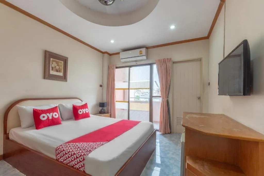 Bed in OYO 1125 Chokdee Inn