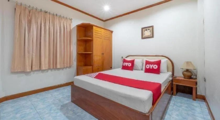 Bed in OYO 1125 Chokdee Inn