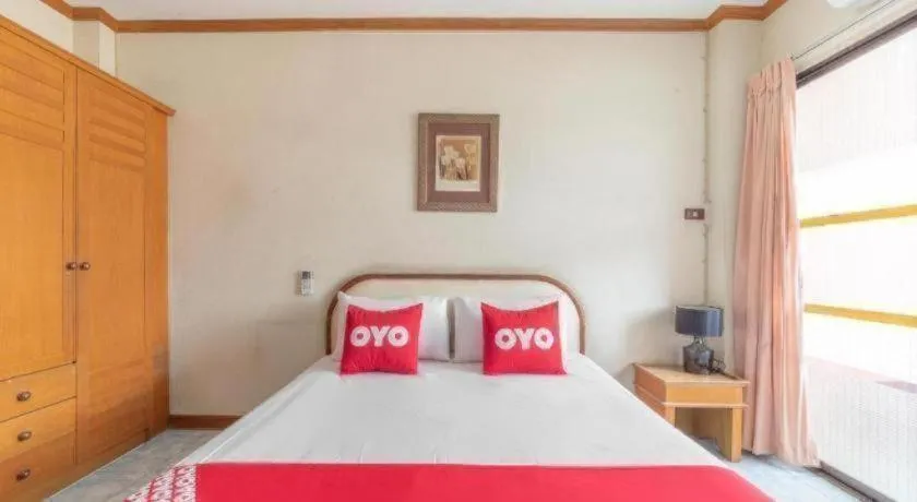 Bed in OYO 1125 Chokdee Inn