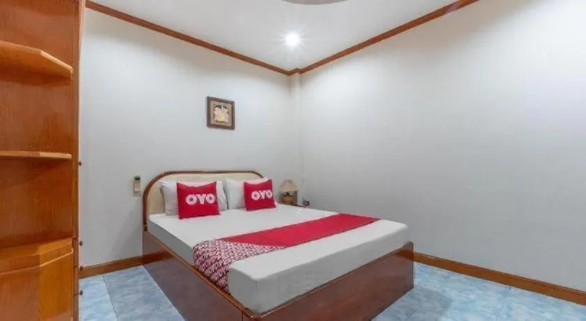 Bed in OYO 1125 Chokdee Inn