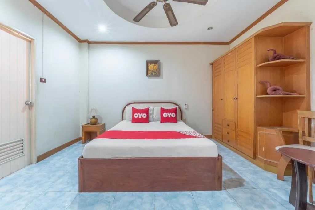 Bed in OYO 1125 Chokdee Inn