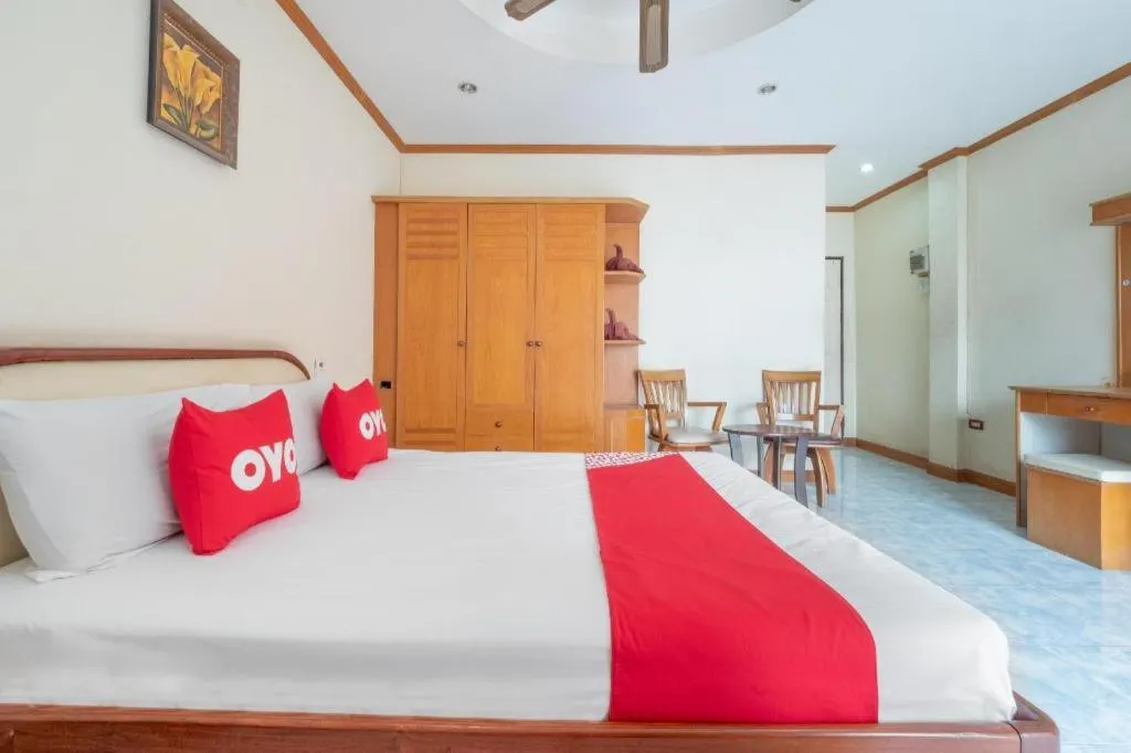 Bed in OYO 1125 Chokdee Inn