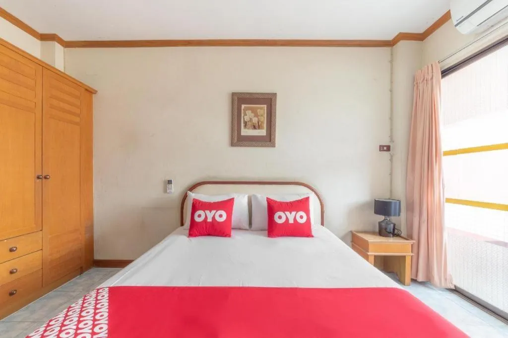 Bed in OYO 1125 Chokdee Inn