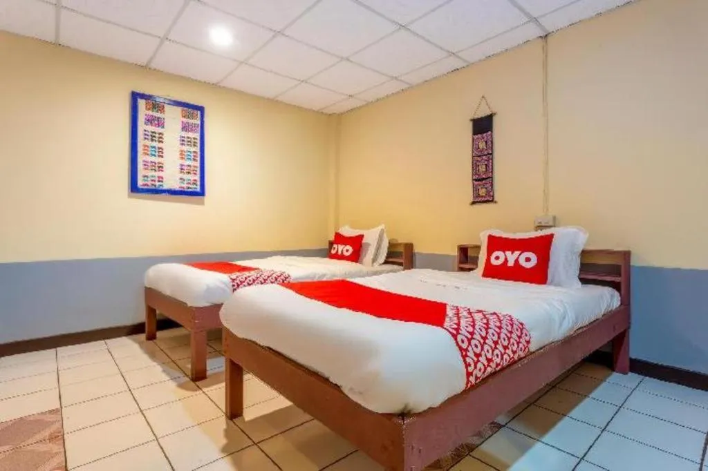 Bed in OYO 1000 Maetang Hotel