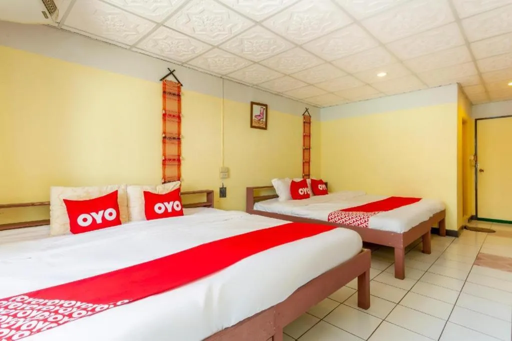 Bed in OYO 1000 Maetang Hotel