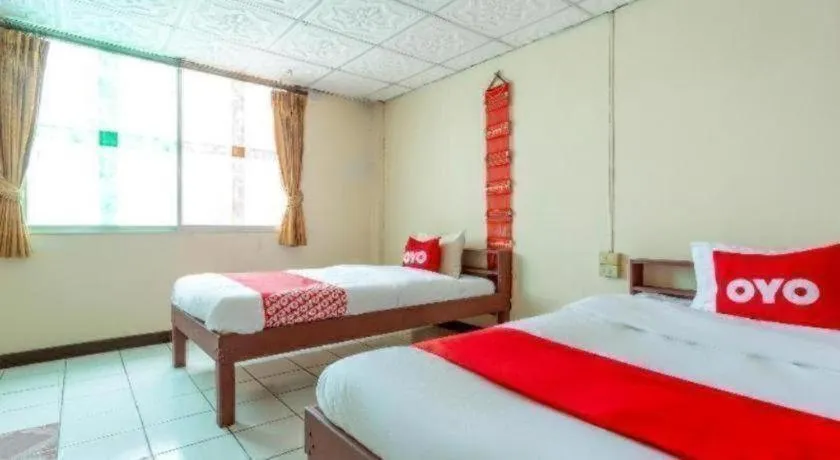 Bed in OYO 1000 Maetang Hotel