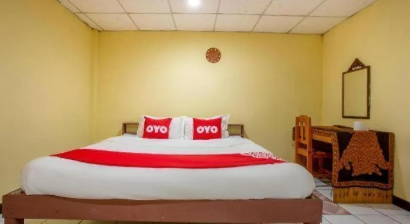 Bed in OYO 1000 Maetang Hotel