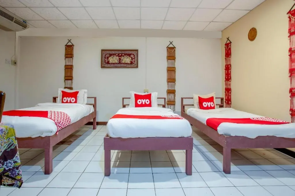 Bed in OYO 1000 Maetang Hotel