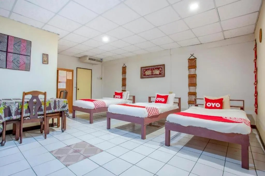 Bed in OYO 1000 Maetang Hotel