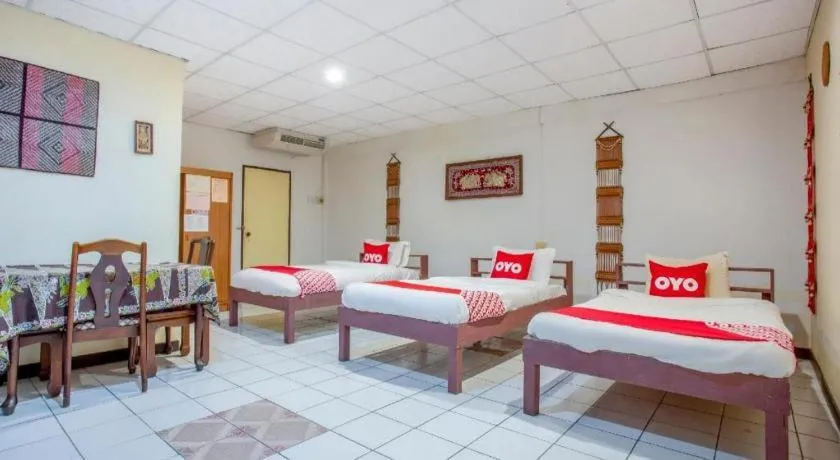 Bed in OYO 1000 Maetang Hotel