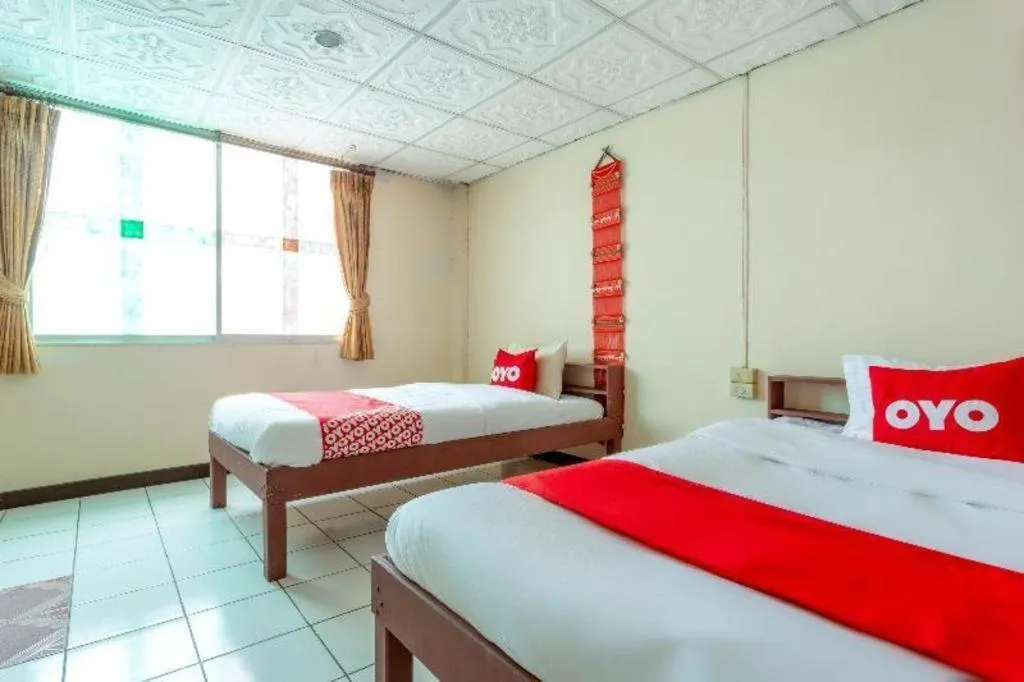 Bed in OYO 1000 Maetang Hotel