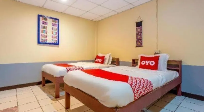 Bed in OYO 1000 Maetang Hotel