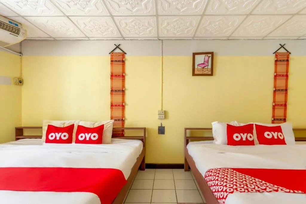 Bed in OYO 1000 Maetang Hotel