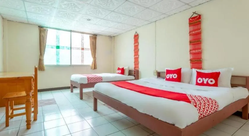 Bed in OYO 1000 Maetang Hotel
