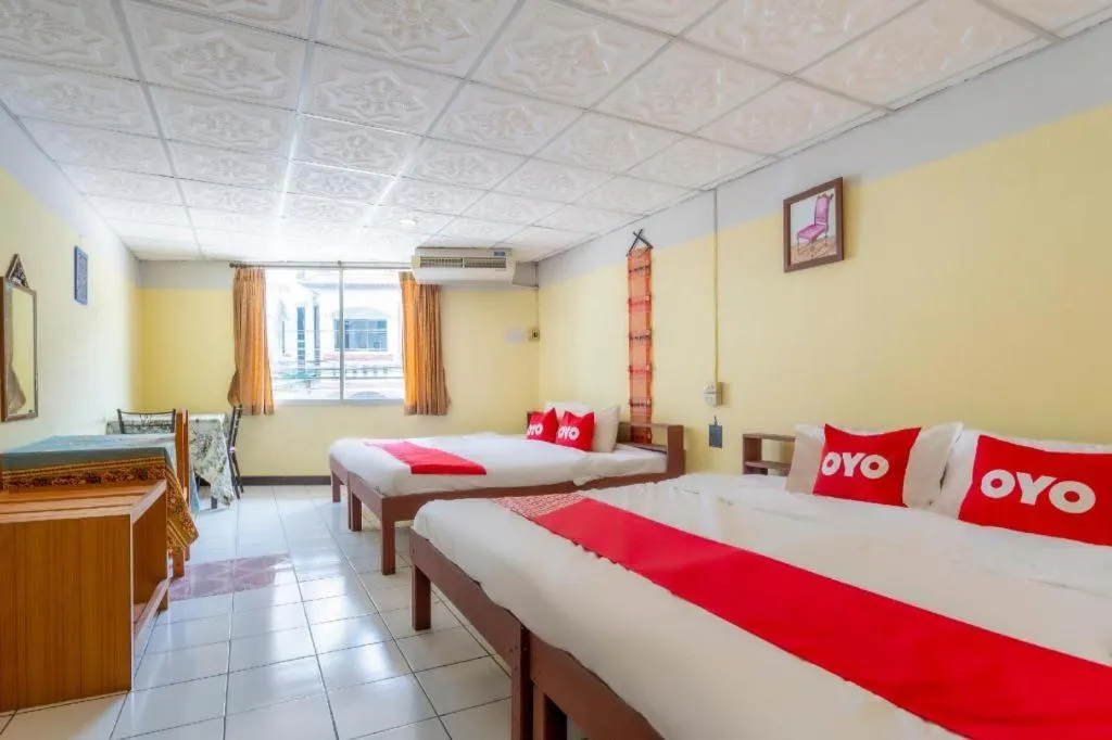 Bed in OYO 1000 Maetang Hotel