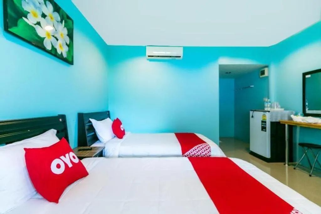 Bed in OYO 981 Fluke and Flame Cha Am