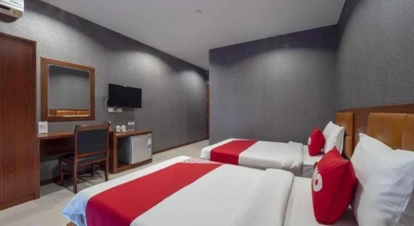 Bed in OYO 1130 CK Resort Pattaya