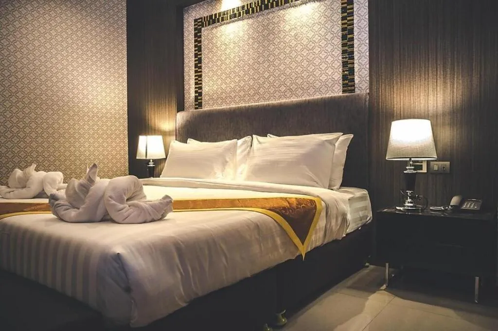 Bed in OYO 1130 CK Resort Pattaya