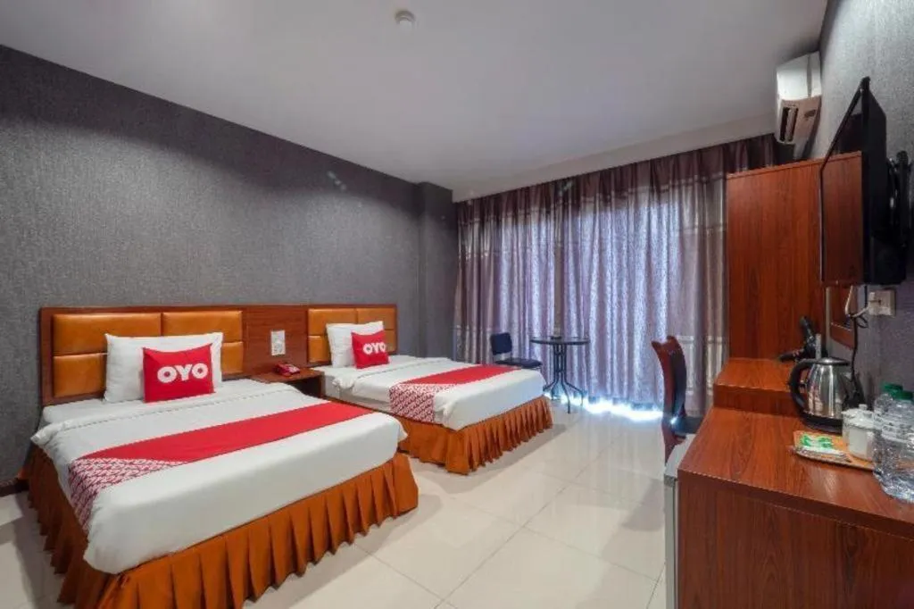 Bed in OYO 1130 CK Resort Pattaya