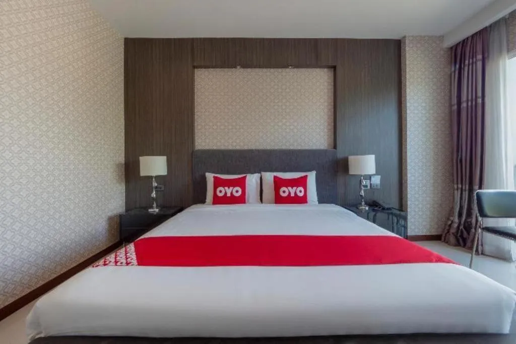 Bed in OYO 1130 CK Resort Pattaya