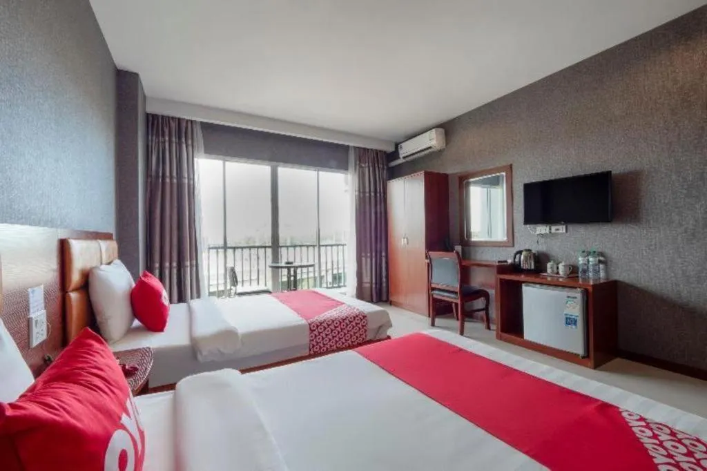 Bed in OYO 1130 CK Resort Pattaya