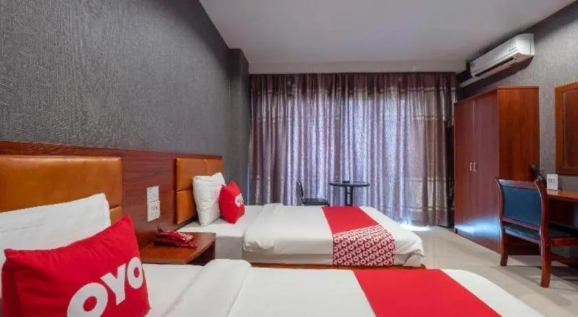 Bed in OYO 1130 CK Resort Pattaya