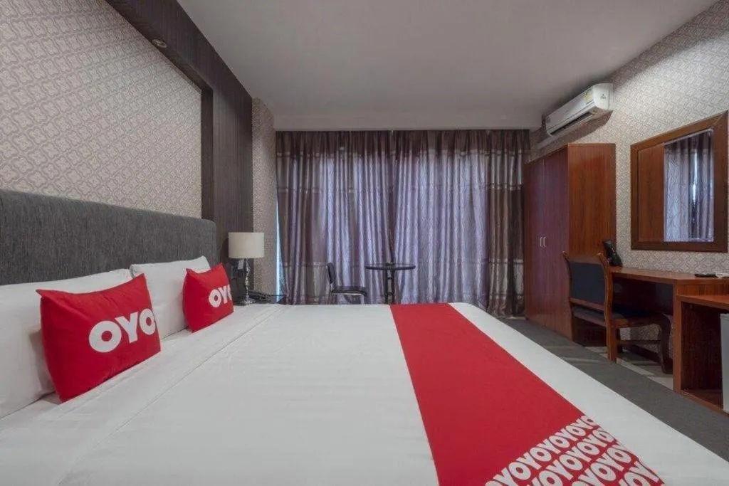Bed in OYO 1130 CK Resort Pattaya