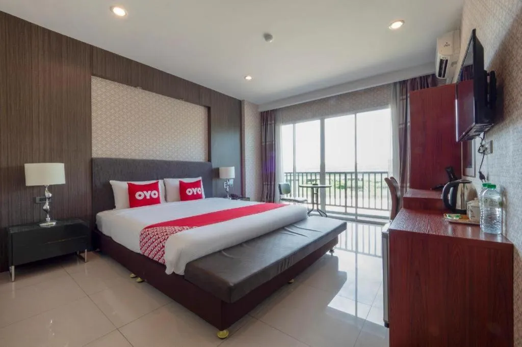 Bed in OYO 1130 CK Resort Pattaya