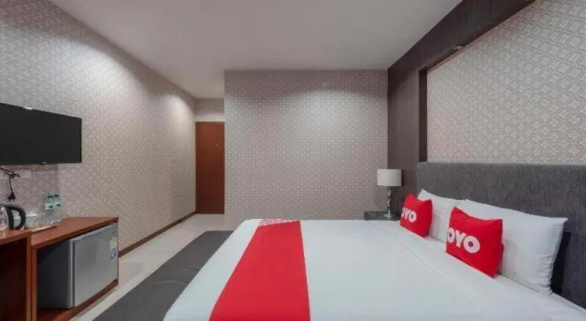 Bed in OYO 1130 CK Resort Pattaya