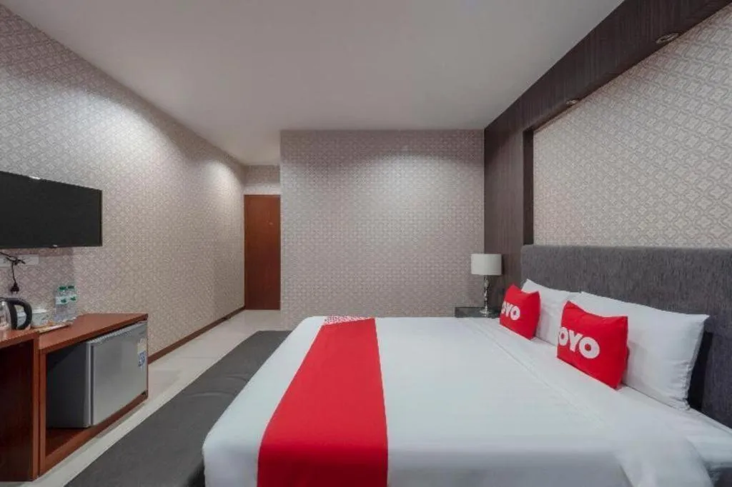 Bed in OYO 1130 CK Resort Pattaya