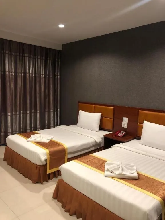 Bed in OYO 1130 CK Resort Pattaya